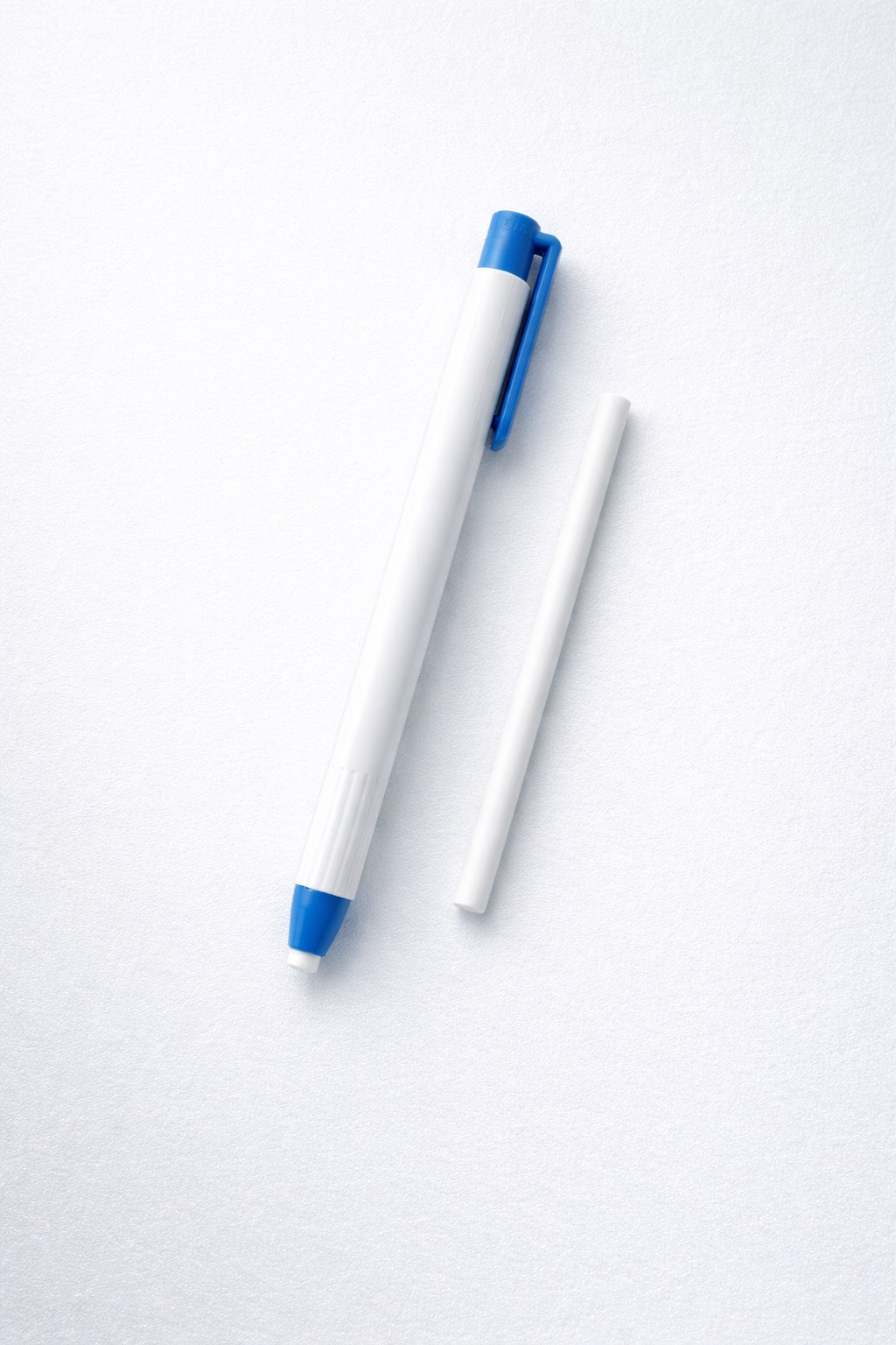 knock type eraser with a eraser lead on a white background