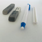 two sand erasers and knock type erasers pen with two extra leads in kuroshi Japan